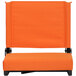An orange stadium seat cushion with black edges.