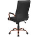 A Flash Furniture black leather office chair with rose gold legs.