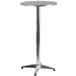 A Flash Furniture aluminum round bar table with base.