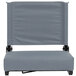 A grey Flash Furniture Grandstand comfort seat with a fabric cover and black edges.
