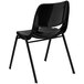 A black Flash Furniture stack chair with a black frame.