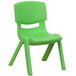 A green plastic Flash Furniture school chair with legs.