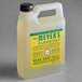A white plastic Mrs. Meyer's Clean Day hand soap jug with a yellow label.