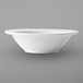 A Tuxton Pacifica bright white china fruit bowl with a white rim.