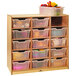 A Whitney Brothers wooden storage cabinet with plastic bins on shelves.