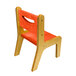 A Whitney Brothers wooden children's chair with a hot pumpkin seat and back.