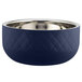 A Bon Chef cobalt blue bowl with a silver rim.