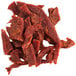 A pile of Uncle Mike's Original beef jerky on a white background.