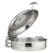 A silver stainless steel Bon Chef brazier pan with a slow down hinged glass lid.