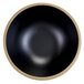 A black melamine bowl with a gold rim and white circle.