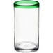 An Acopa cooler glass with a clear surface and a green rim.