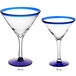 Two Acopa martini glasses with blue rim and base.
