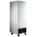 A large silver Beverage-Air reach-in refrigerator with a stainless steel exterior and bottom wheels.