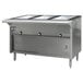 An Eagle Group stainless steel hot food table with three open wells on a counter.