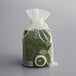 A plastic bag with green and white Noble Eco hotel toiletries inside.