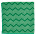 A green cloth with a black zigzag pattern on a white background.