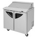 A stainless steel Turbo Air refrigerated sandwich prep table with two doors.
