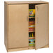 A Whitney Brothers wooden classroom supply cabinet with the door open and shelves inside.