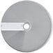 A circular silver metal Robot Coupe dicing disc with a white label.