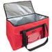 A red and black Sterno SpeedHeat insulated food pan carrier bag with a black handle.