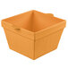 A square orange cast aluminum container with a handle.