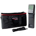 A black Breville sous vide circulator in a black bag with red zippers.
