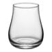 An Acopa Select whiskey glass filled with a small amount of liquid.