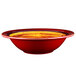 A close up of a red Elite Global Solutions Cantina melamine bowl with a yellow rim.