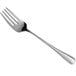 An Acopa Edgeworth stainless steel serving fork with a silver handle.