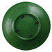 A green circular melamine platter with black screws on it.