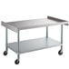 A stainless steel Regency equipment stand with wheels.