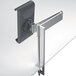 A silver metal table clamp tablet holder with a swinging arm.