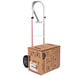 A Magliner hand truck with a box on it.