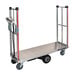 A silver and black Magliner motorized utility cart with wheels and handles.
