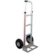 A Magliner hand truck with pneumatic wheels and a single grip handle.