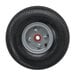 A Magliner hand truck wheel with a black rim and silver rim.