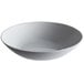 An Arcoroc granite gray opal glass deep coupe plate with a white background.