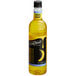 A close up of a bottle of DaVinci Gourmet Sugar Free Banana Fruit Syrup with a banana on it.