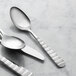 A set of 12 Reserve by Libbey stainless steel teaspoons.