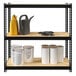 A black Hirsh Industries boltless shelving unit with particleboard shelves holding yellow and white buckets.