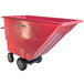 A red motorized Magliner hopper cart with wheels.