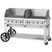 A Crown Verity 60" outdoor grill with wheels and a lid.