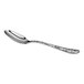 A shiny metal spoon with a textured handle is shown against a white background.