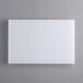 A white rectangular board on a gray background.