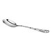 A shiny metal spoon with a textured handle is shown against a white background.