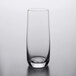 A close up of a clear Chef & Sommelier beverage glass on a white surface.
