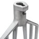 A Vollrath flat beater with a metal handle.