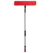 A Lavex red rectangular mop with a black and silver handle.