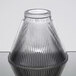 A Sterno clear glass lamp shade with a pleated design.