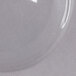 A clear plastic Dart Conex dome lid on a white surface.